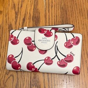 Coach Cherry Patterned Wristlet in Cream and Red